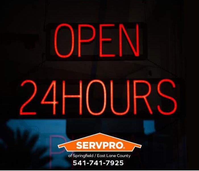 A sign reading, ‘Open 24 Hours’ is shown.