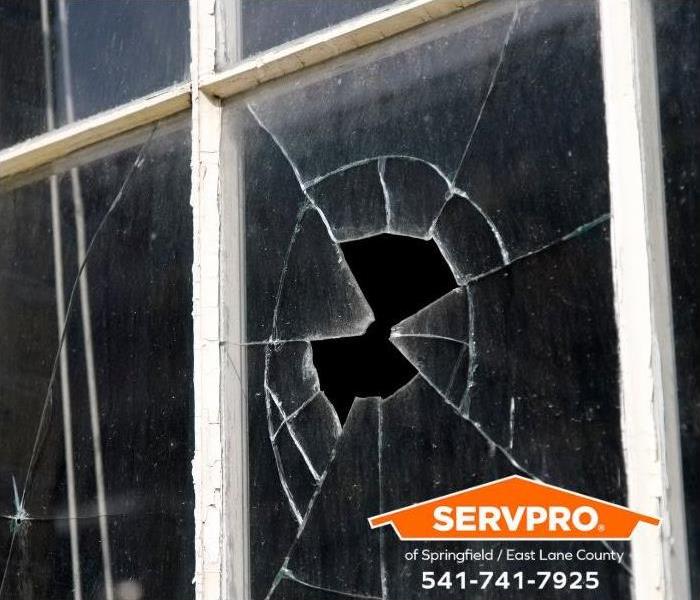 A broken window is shown.